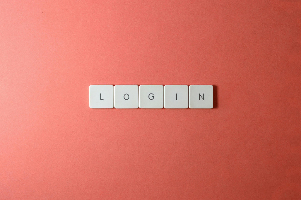 surface with letter blocks that make out the word login